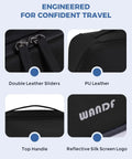 Close-up of men's Dopp kit toiletry bag with PU leather, double sliders, top handle, reflective logo.