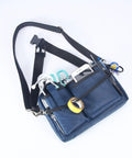 Heavy Duty Utility Waist Pack With Modular Tool Dividers And Waterproof Zippers For Job Site Hustlers Seeking Kick Ass Storage For Drill Bits Pliers And Pro Gear Built Tough As Nails Every Single Shift, navy tool organizer with various tools visible.