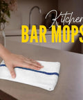 Person using a kitchen mop towel on a countertop. Value Pack Of 36 Absorbent 16x19 Inch Terry Cloth Cleaning Rags For Home And Business.