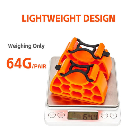 Clip On Bike Stabilizer And 30mm Elevation Tool For Inverted Parking Easy Flip And Clean Setup With No Slip Rubber Straps Fits 29 To 34mm Handlebars For Road Mountain And E Bike Maintenance Orange, weighing 64g on a scale
