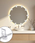 32 Pack Slick Clear Plastic Mirror Clips With Rock Solid Rust Resistant Metal Screws Frameless Glass Mounting Hardware For Wall Cabinet Door And Picture Frames Straight Up Easy Install holding a round mirror in a well-lit bathroom.