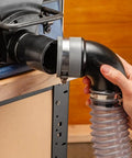 Rockler Dust Right Quick Change Elbow Adapter with Flexible Rubber Boot and Metal Clamp, 2.5 inch tool port fitting in use.