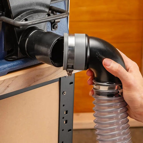 Rockler Dust Right Quick Change Elbow Adapter with Flexible Rubber Boot and Metal Clamp, 2.5 inch tool port fitting in use.