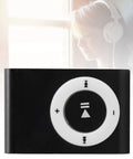 Go To Pocket MP3 Player For On The Go Tunes, Mini Clip On Music Player, close-up of black front controls with headphones in background