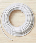 Heavy Duty 400 Ft 14 AWG 5 Conductor SJTO Rated Portable Power Extension Cord Bright White Cover coiled on wood surface.