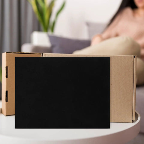 Polyurethane Foam Padding Pack Cut To Size Four Pieces Black shockproof protection on box in living room setting