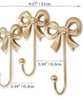 Three Bow Antique Gold Wall Hook Set Cast Iron Wall Mounted Hangers For Coats Bags Towels And Decor Elegant Rustic Finish