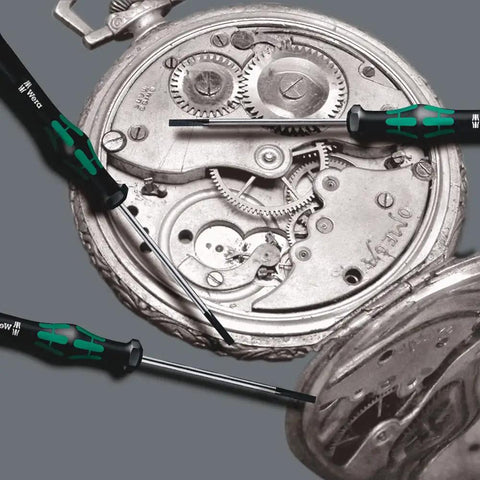 Kraftform Micro 2069 Nutspinner Electronics Precision Screwdriver with 5.5mm head in watch repair showcasing ergonomic handle and blade.