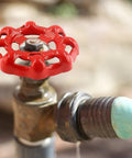 Heavy Duty Red Cast Steel Outdoor Faucet Handle Replacement Round Wheel Valve Spigot Knob For Yard Hose Pipe Rust Proof Plumbing Parts close-up view.