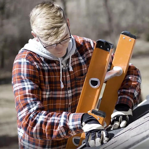 Person installing Foam Gutter Guard K-Style Gutter Filter Insert 6 Inch Surface Coated for year-round leaf protection.