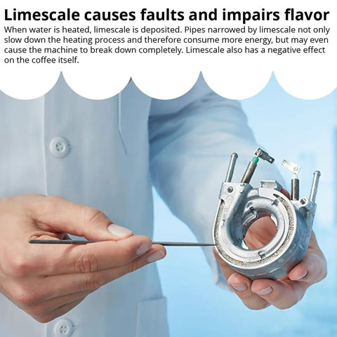 Hand holding limescale deposit from Clearyl Smart Coffee Machine With Intelligent Water System Auto Filter Alerts Three Filters Included Gray Finish For Easy, No Fuss Brewing At Home Or In The Office And Seamless Filter Change Prompts