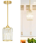 Brushed Gold Crystal Pendant Light With Adjustable Rods And Sloped Ceiling Mount No Sweat Install Super Smooth Hang Straight Up Elegant Lamp For Kitchen Island Dining Space E26 Base hanging above kitchen counter.