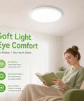 Woman reading under Six Pack 12 Inch LED Flush Mount Ceiling Lights No Fuss 24W 3200 Lumens Replaces Up To 240W in living room