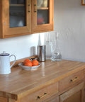 Vintage Brass Cabinet Handles Set Of 6 With 128mm Hole Center Striped Design installed on wooden kitchen drawers.