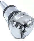 Close-up of MT2 Revolving Center Shank With 3 Jaw Self Centering Lathe Chuck Two And A Half Inch Outer Diameter 65mm M14 By 1 Thread.