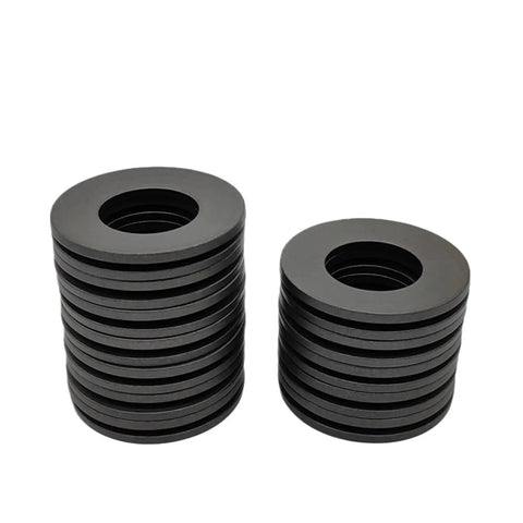 1000 Piece Bulk Pack Of Heavy Duty Disc Spring Washers featuring rock solid preload and noise reducing flex for tough applications and hassle free mechanical upgrades measuring 12 millimeters stacked in two piles.