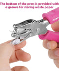 One Hole Punch With Soft Grip Handle For Paper One Quarter Inch Hole Punch Pink With Mess Tray Six Sheet Capacity in use