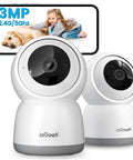2K Indoor Security Camera System Dual Pack With 360 Degree Pan Tilt AI Tracking Night Vision 2 Way Audio Phone App Access 24 Seven SD Card Storage Alexa Compatible Smart Home Baby Pet Monitor, featuring two white cameras and a smartphone screen showing a girl with a dog.