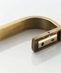 Close-up of Slick Brushed Bronze Towel Bar Rail Wall Mount with concealed screw design, showing antique brass holder.
