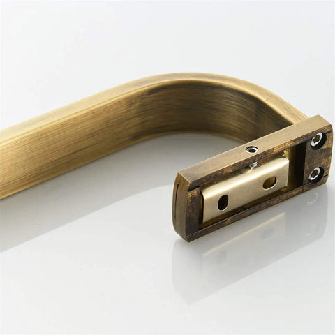 Close-up of Slick Brushed Bronze Towel Bar Rail Wall Mount with concealed screw design, showing antique brass holder.