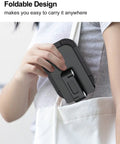 Person placing black adjustable height folding phone stand in a bag, highlighting portability and compact design.