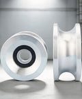 Heavy Duty U Channel Metal Pulley Wheel With Center Bearing 85 Mm Diameter For Lifting, Cable Guidance, And Line Routing, 20 Mm Center Bore Rigging Sheave, Easy Alignment And Safe Hoist Operation, silver metal wheel side view