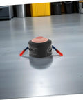 Automatic Aerosol Fire Extinguisher Patch Offering A No Sweat Setup For Quick Flare Zapping On Car Dashboards Wall Outlets And Power Strips on a garage floor