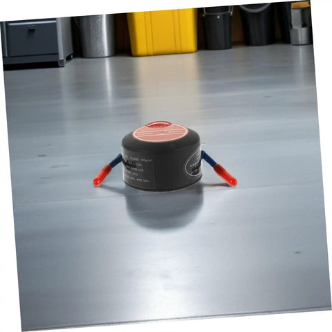 Automatic Aerosol Fire Extinguisher Patch Offering A No Sweat Setup For Quick Flare Zapping On Car Dashboards Wall Outlets And Power Strips on a garage floor