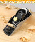 Heavy Duty Seven Inch Block Plane For Woodworking with adjustable steel blade on wooden surface with shavings.