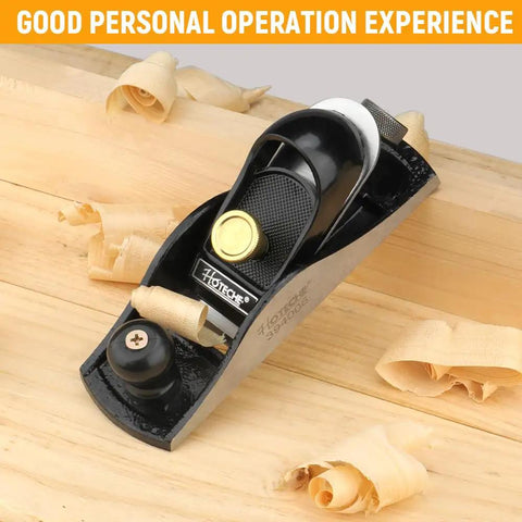 Heavy Duty Seven Inch Block Plane For Woodworking with adjustable steel blade on wooden surface with shavings.