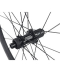 Close-up of Carbon Disc Brake Wheelset With 50mm Deep Rim For 700c Road Bikes Tubeless Ready Clincher Beast Mode Aero MT075 Hub