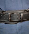 Tradesman Pro Modular Trimming Pouch with belt clip showing durable 1680D ballistic weave material and secure buckle system.