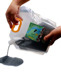 Coarse Silicon Carbide Grit 60 90 For Rock Tumblers Step 1 Polishing Media 5 lb pack being poured from a spout