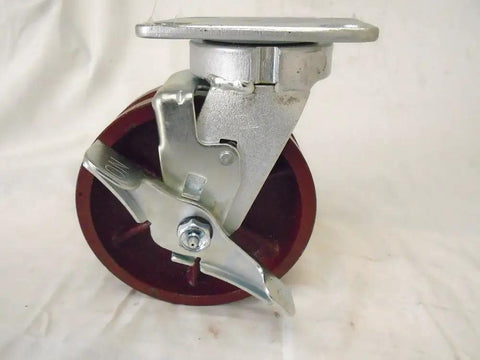 Heavy Hitter 6 Inch Swivel Casters With Secure Top Lock Kingpinless Base V Groove Treads Built Solid Ductile Steel Handles 1500 Lbs Smooth Rolling Red Cart Wheels Set Of Four showing a close-up of the swivel mechanism.