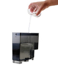 Fully Automatic Espresso Machine With Stainless Steel Cup Warmer And Smart Sensors pouring water into the tank.