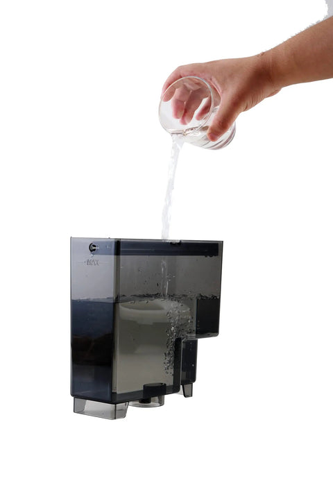 Fully Automatic Espresso Machine With Stainless Steel Cup Warmer And Smart Sensors pouring water into the tank.