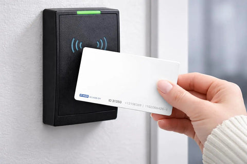 Person using 200X iCLASS Direct Image And Thermal Transfer Cards, 25 Pack, 13.56 MHz Smart Cards With High Security Mutual Authentication