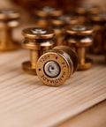 Solid Brass Bullet Rivets With Screw Posts Give Your Leather Accessories A Badass Antique Vibe Perfect For Custom Wallets And Rugged Backpack Repair Projects on a wood surface.