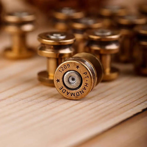 Solid Brass Bullet Rivets With Screw Posts Give Your Leather Accessories A Badass Antique Vibe Perfect For Custom Wallets And Rugged Backpack Repair Projects on a wood surface.
