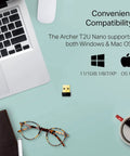 Nano AC600 USB WiFi Adapter Archer T2U Nano Dual Band USB Network Transceiver shown with laptop and accessories