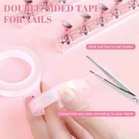 Two Sets Pink Nail Practice Stands With Magnetic Display Bases And Acrylic Nail Holders For Press Ons Includes Double Sided Tape For DIY Home Salon Tools Kit close-up with scissors cutting tape