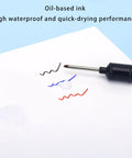 Close-up of Rock Solid Permanent Markers Waterproof Oil Based Writing Markers showing red, blue, and brown ink on paper.