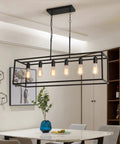 6 Light Rectangle Black Pendant Chandelier With Adjustable Stems hanging over dining table in modern room, open bulb design visible