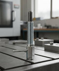 Heavy Duty Spring Indexing Plunger With Rugged L Handle For Snappy Manual Retraction positioned on workshop table surfaces.