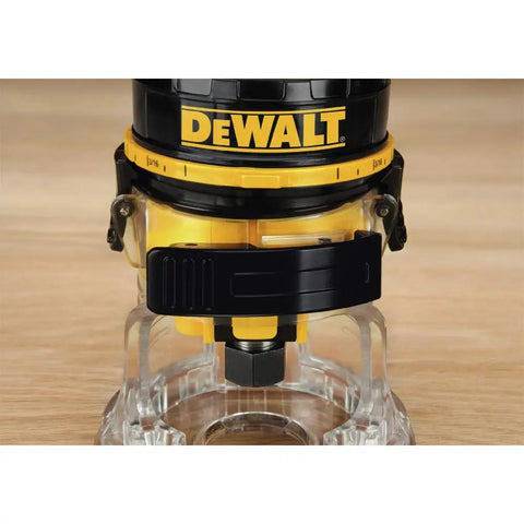 Beast 4.5 Amp Variable Speed Laminate Trimmer With One Quarter Inch Collet, shown on a wooden table, highlighting the spindle lock.