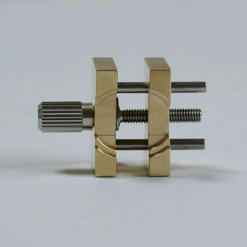 Side view of Pro Grade Extensible Brass Watch Movement Holder with adjustable clamps for precise repair and assembly.
