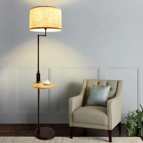 Floor lamp with round tray table beside armchair in living room, globe led floor lamp with five glass orbs tall tree style