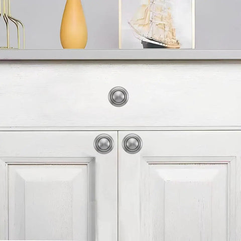 10 Pack Brushed Satin Nickel Cabinet Knobs Beefy Heavy Duty Bifold Closet Door Hardware installed on white cabinet