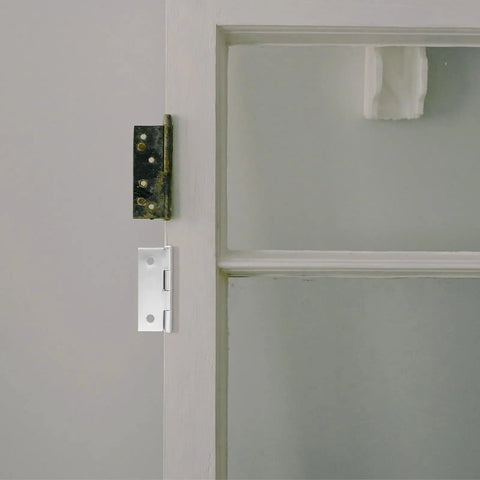 Silver hinge on cabinet door from 30 Pieces Stainless Steel 2 Inch Cabinet Door Hinges Set For Furniture And Cabinets Durable Rust Resistant