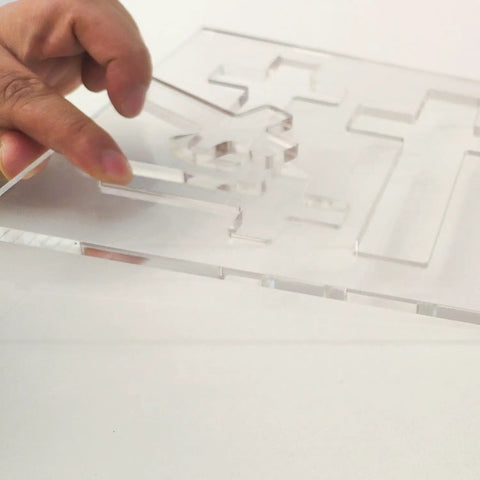 Hella Durable Cross Router Template For Woodworking And DIY Creations Solid Clear Acrylic Ribbon Crosses Inlay Jig With Three Built In Sizes For Zero Stress Layouts, hand placing acrylic piece.